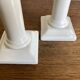 Pair of neo-classical Empire candlesticks from the late 19th century in white porcelain.