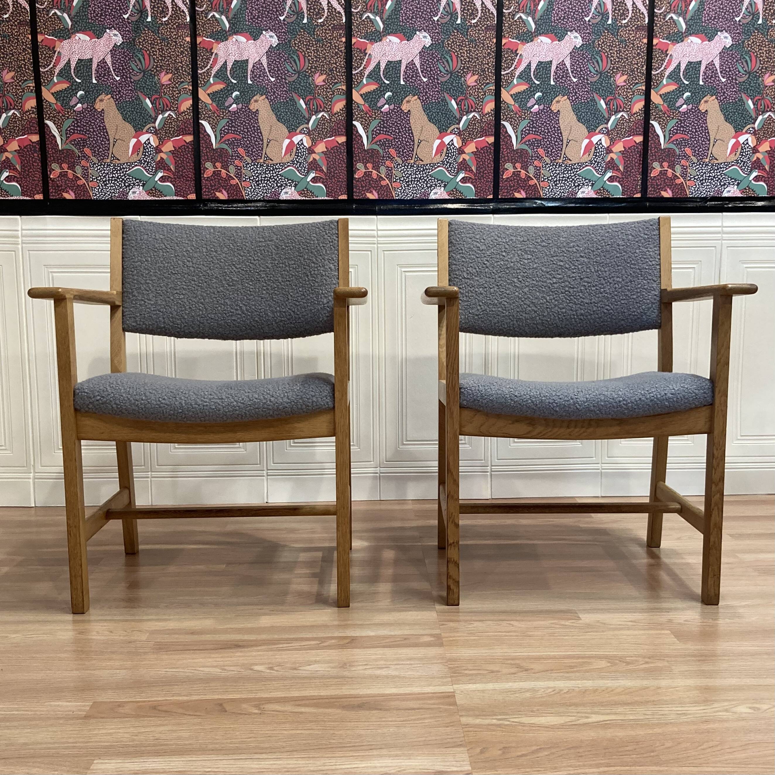 Two armchairs stamped "hans wegner" 1960.