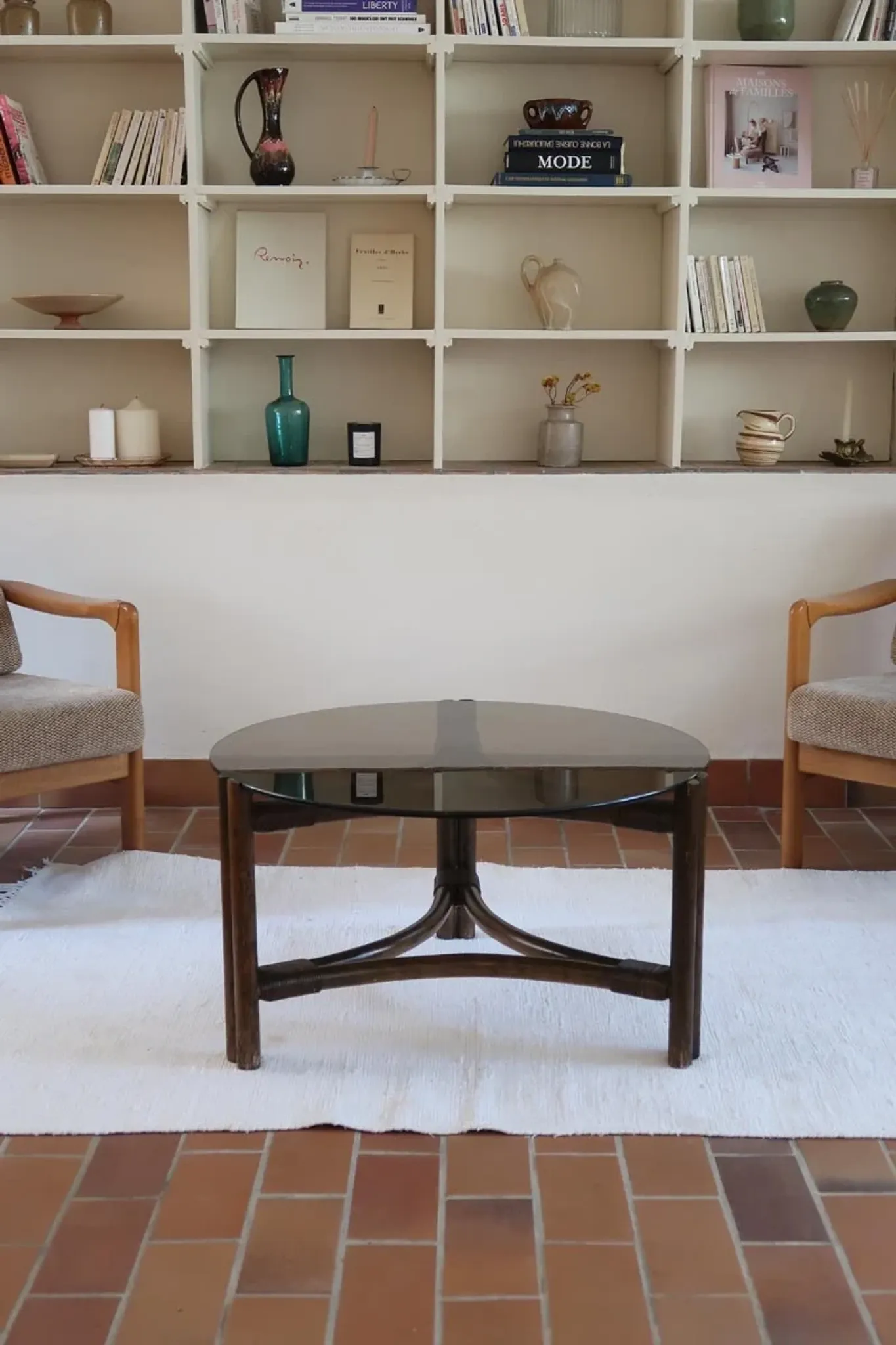 Round coffee table in rattan and smoked glass — 1970s