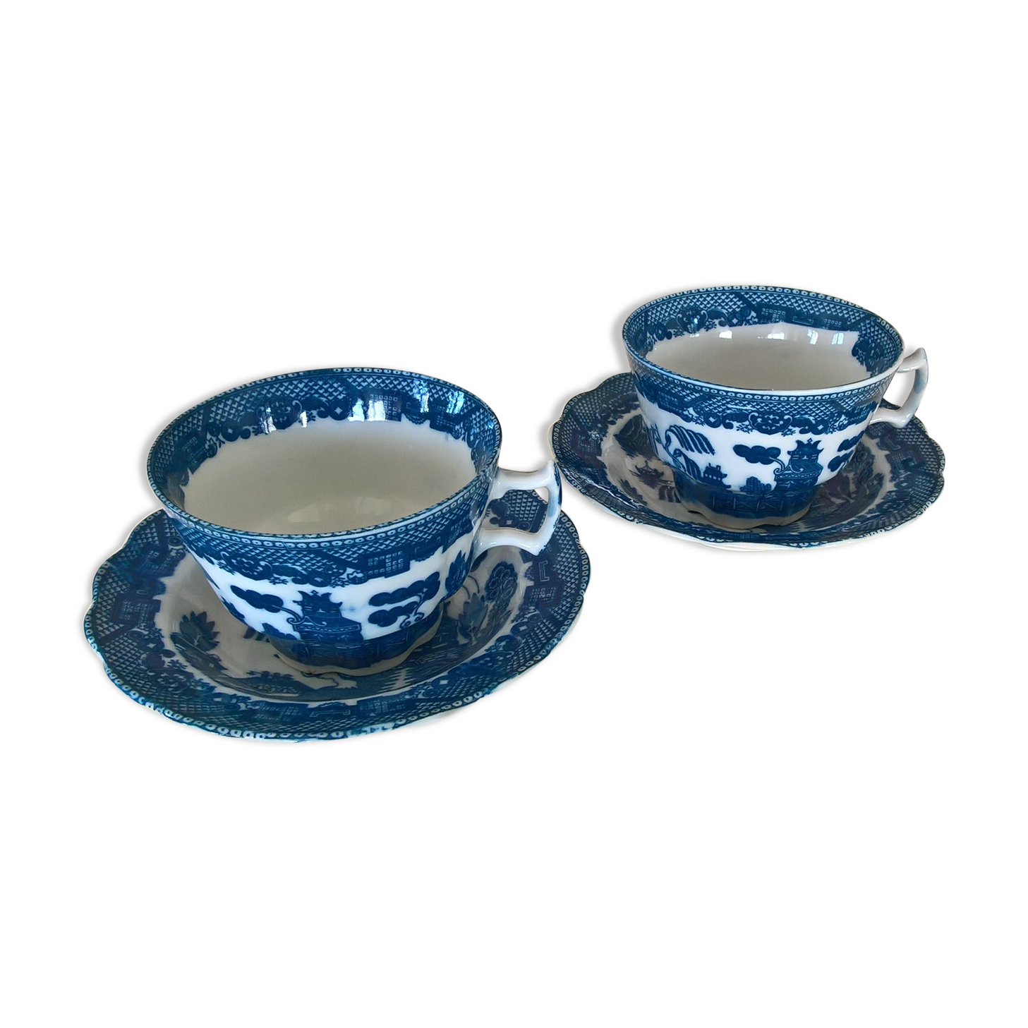 Two Blue Willow porcelain tea cups