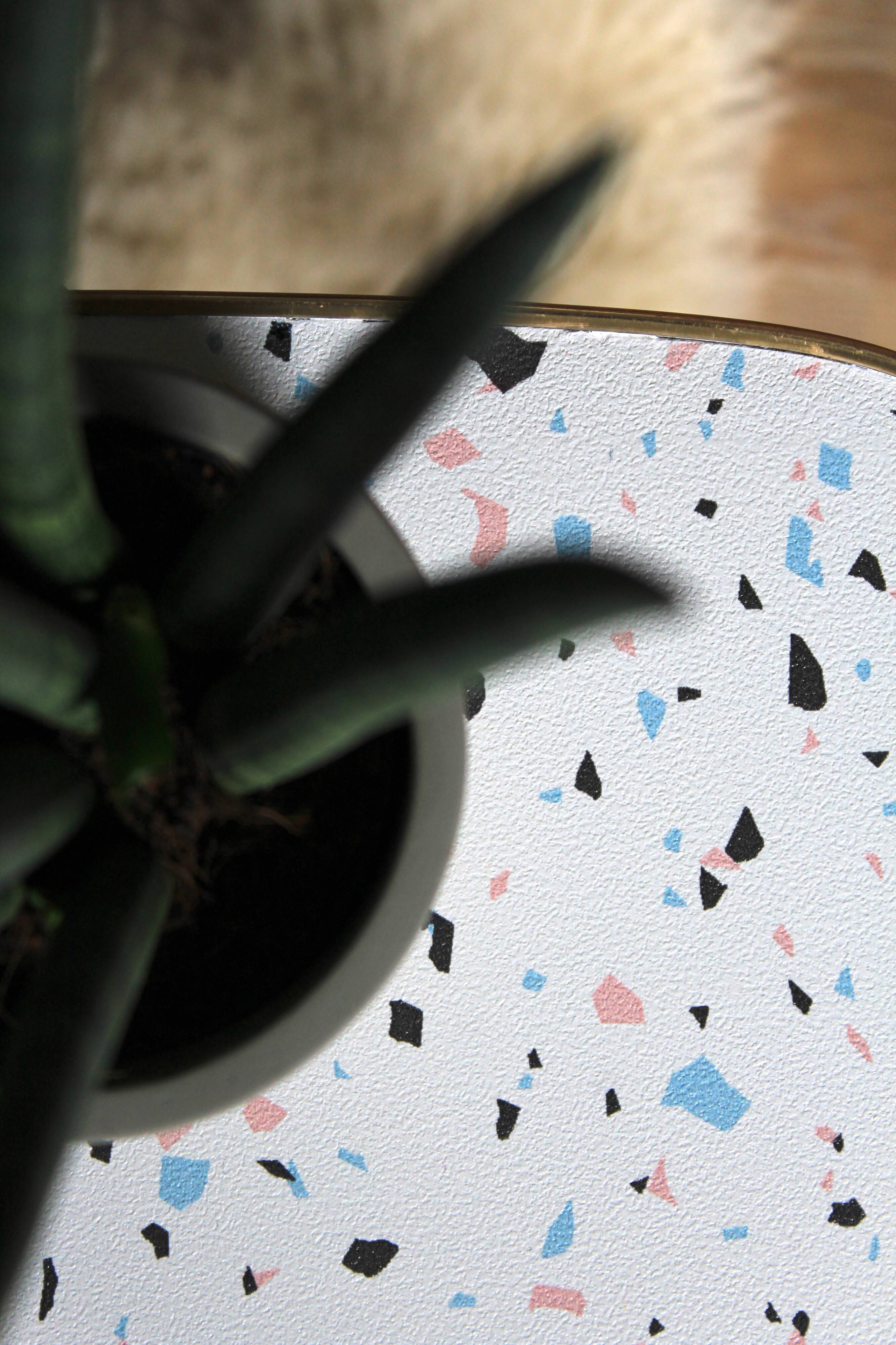 Formica/Terrazzo coffee table with brass compass legs