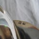 silver metal sugar and silver sugar spoon.