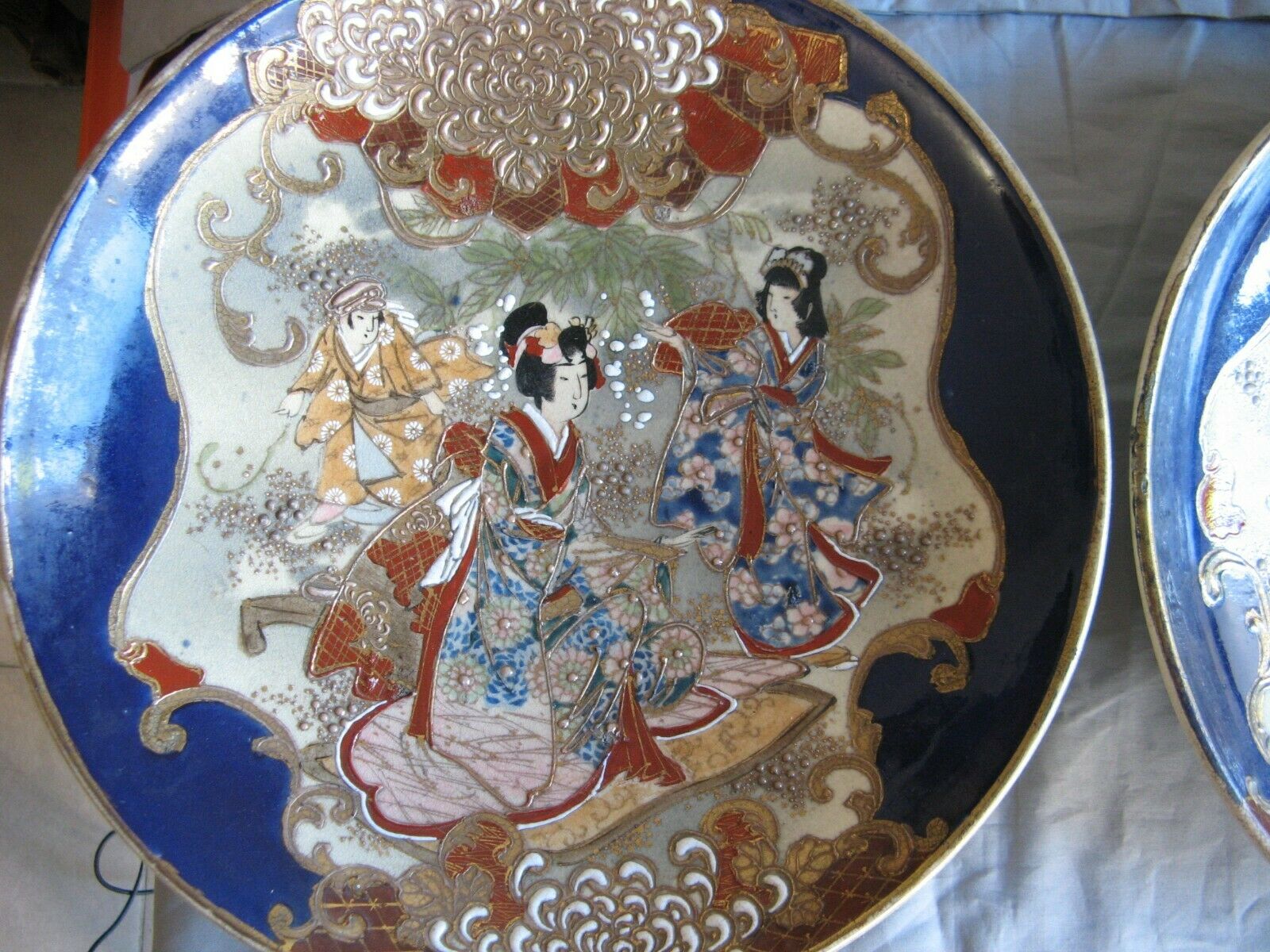 Pair of dishes in Satsuma Kyoto Kinkozan faience late nineteenth
