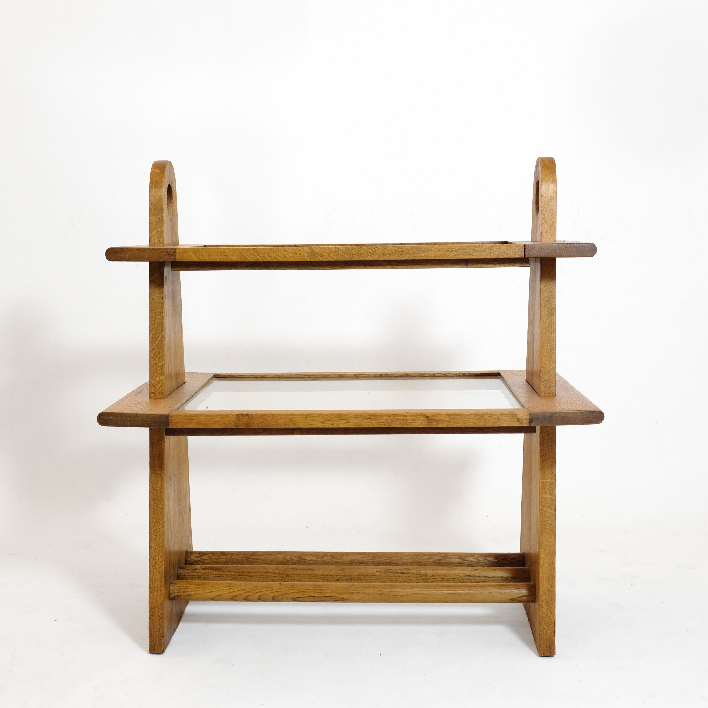 Served in oak and glass from the 50s and 60s.