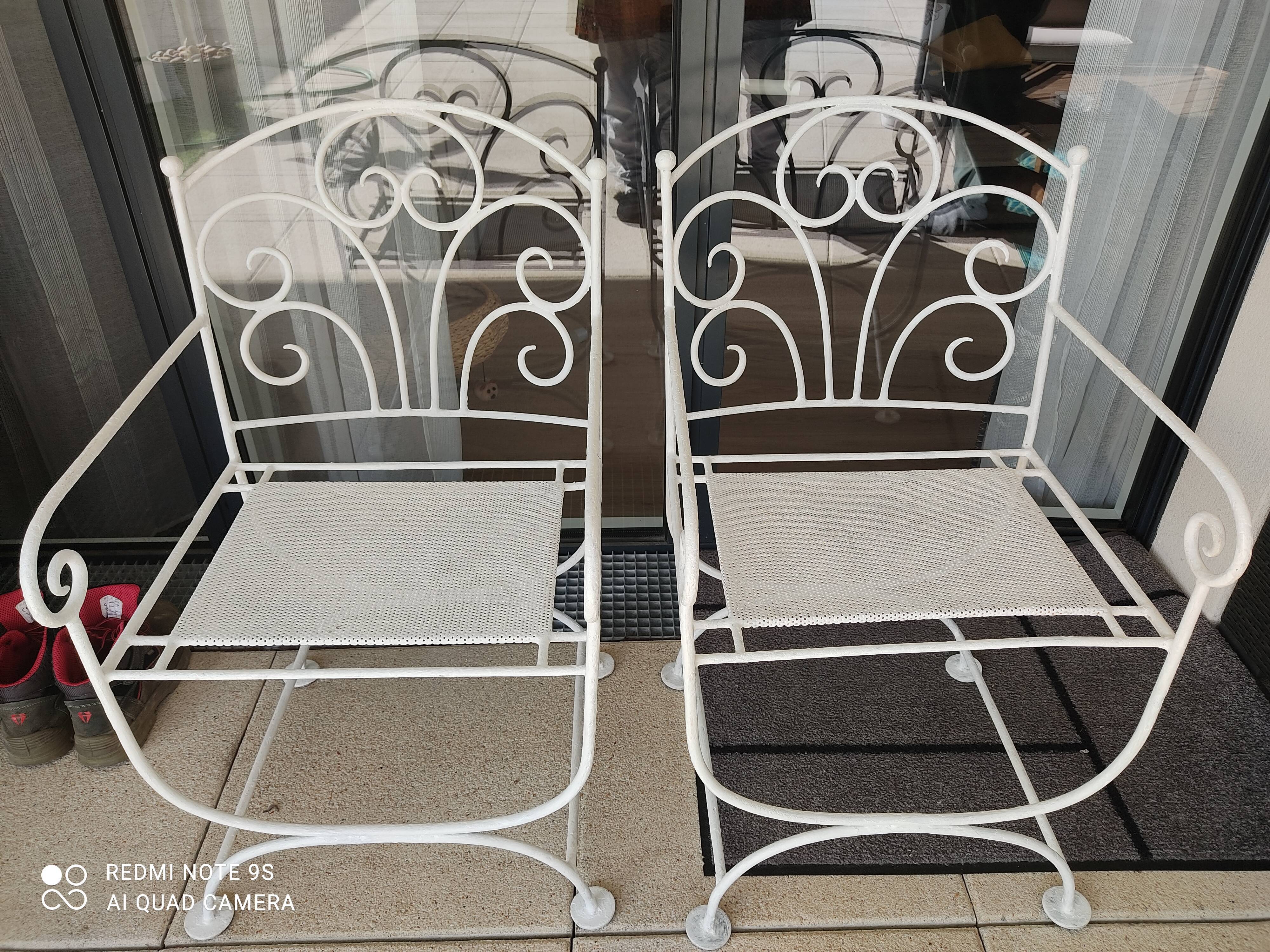 Paire de fauteuils en fer forgé