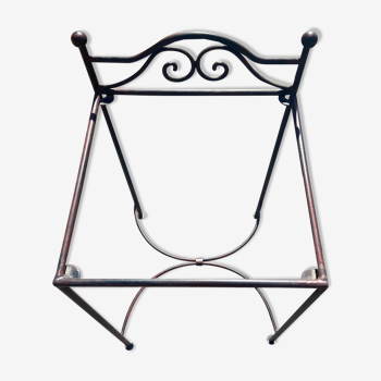 Wrought iron bedside tabletop on glass