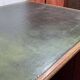 Large English flat desk in mahogany with leather top, early 20th century