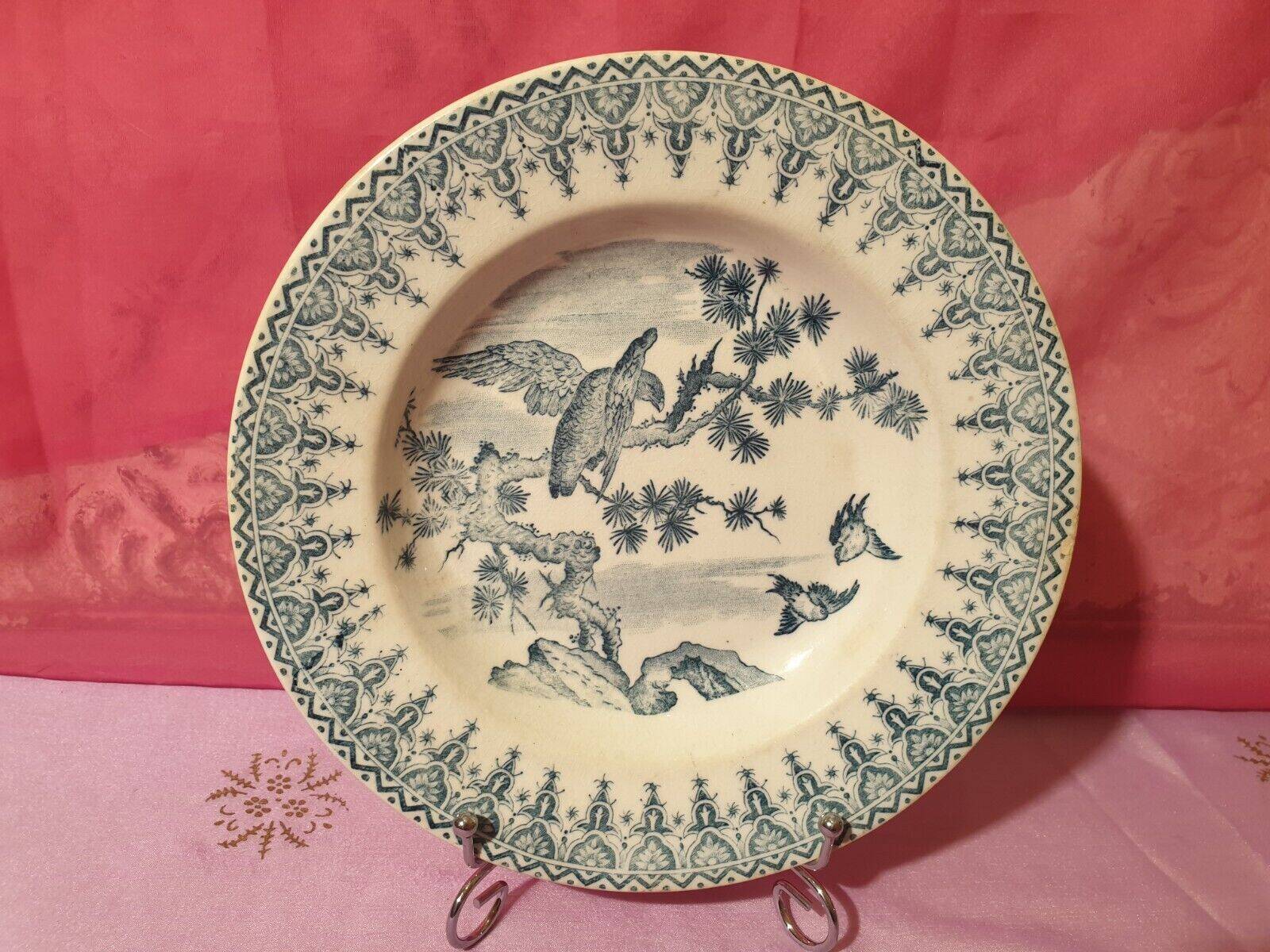 Gien earthenware ceramic soup plate with blue eagle decoration