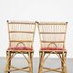 Set of 4 subtle and charming vintage 60s rattan boho chairs with colorful upholstered seats