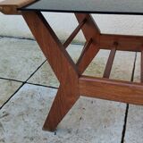 Vintage coffee table from the 1950s reconstruction, wood and glass.