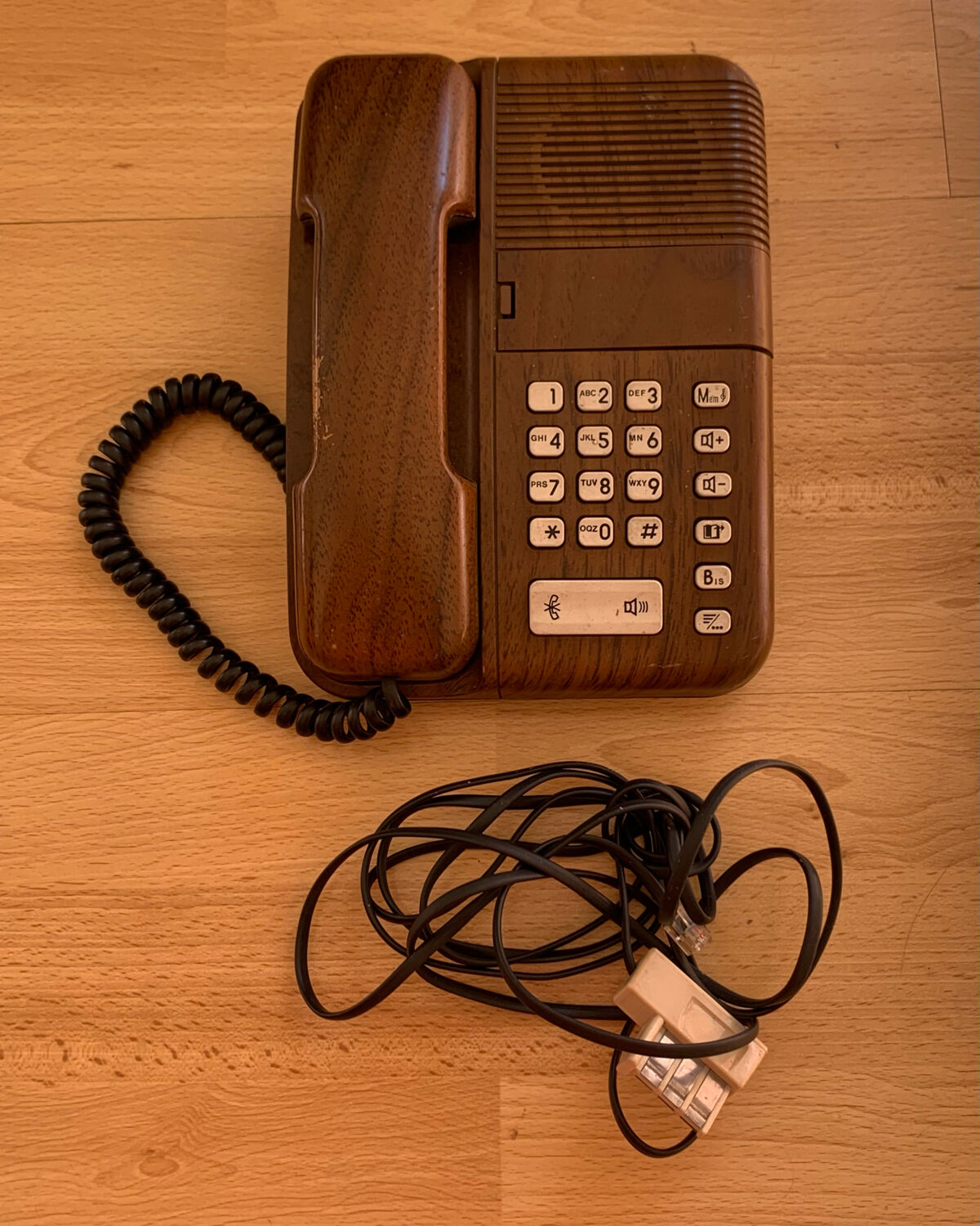 Old Thomson bakelite telephone and vintage wood