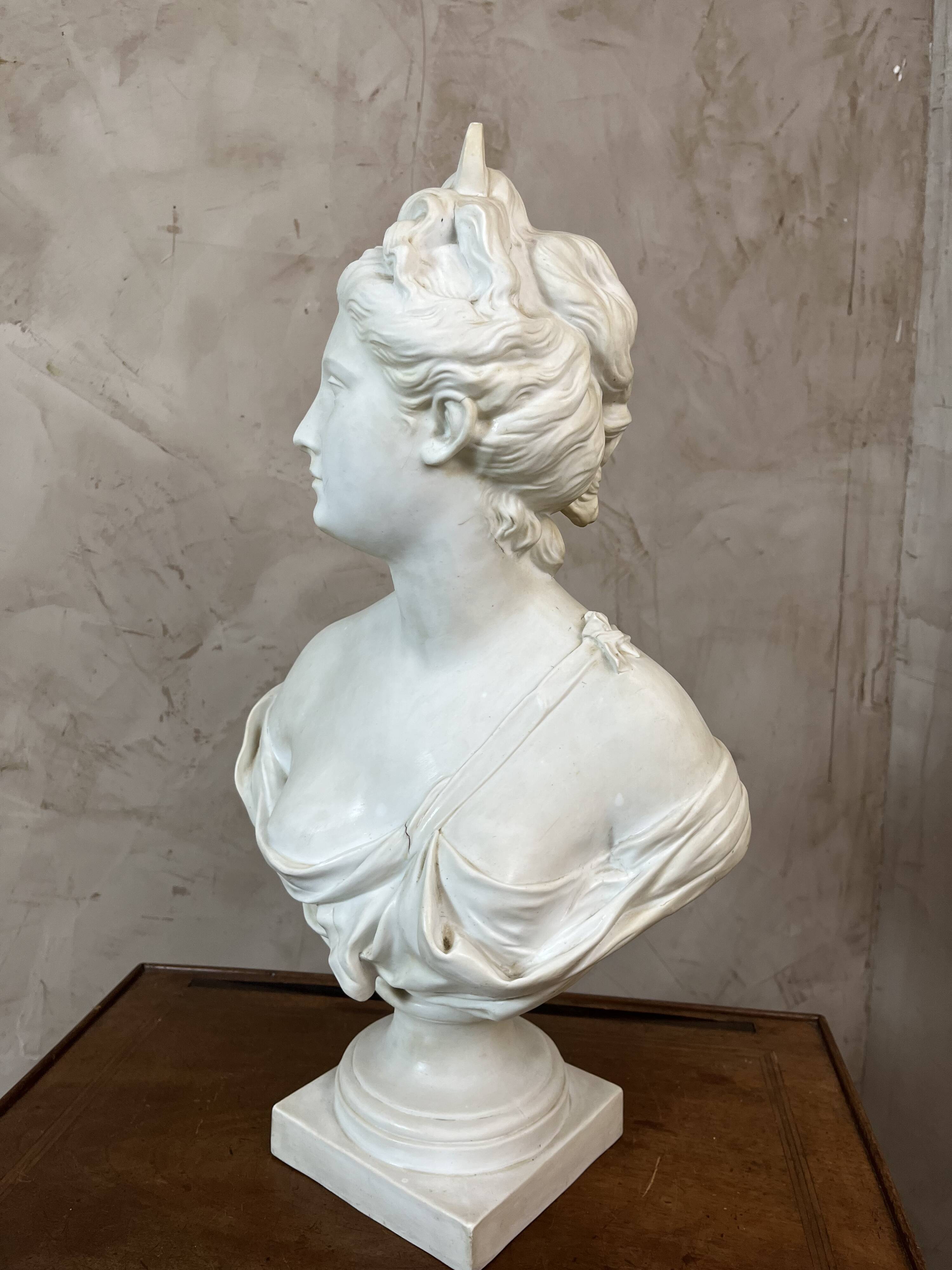 Bust of a woman in Biscuit signed