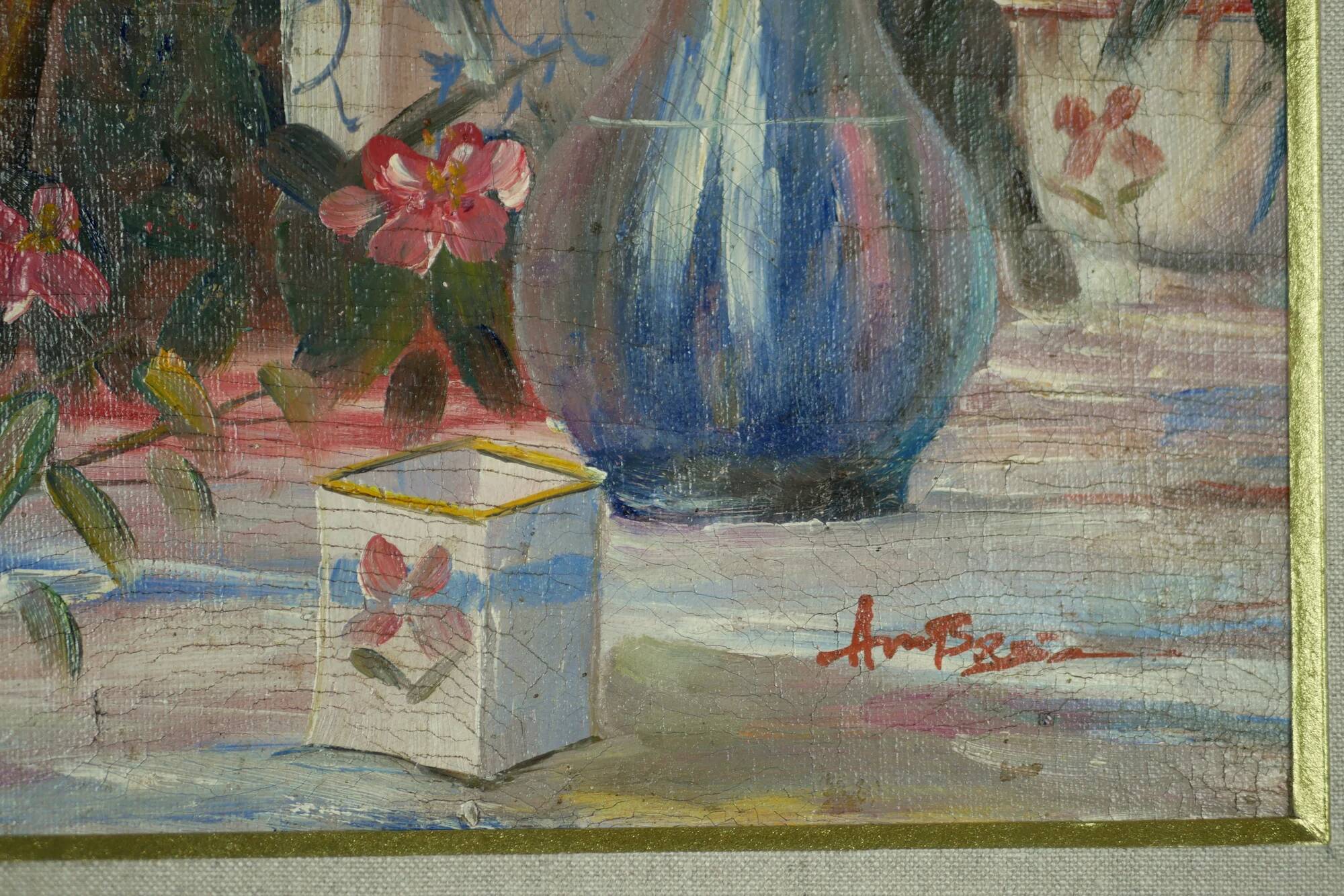 Still life with pink flowers and blue pots.