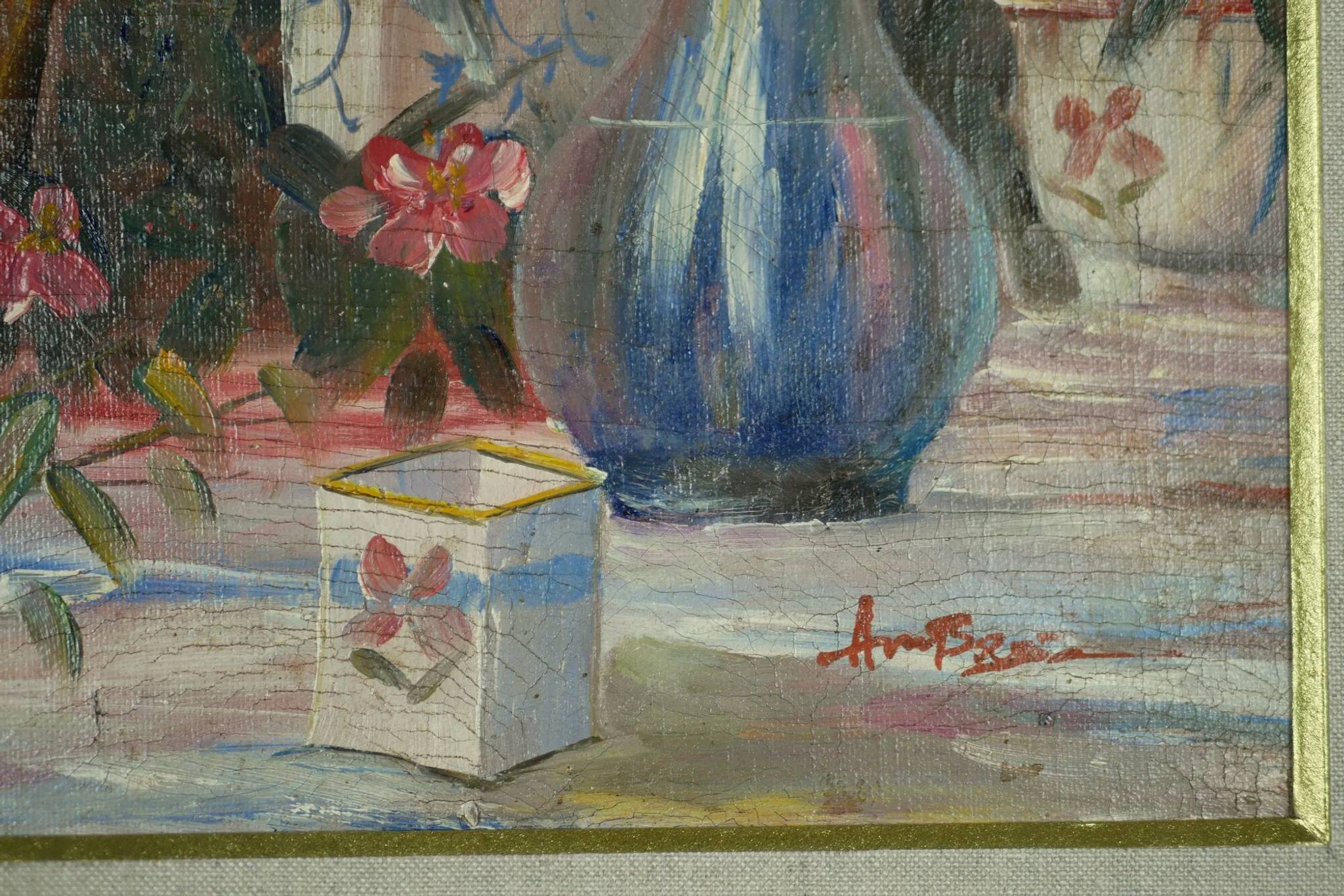 Still life with pink flowers and blue pots.