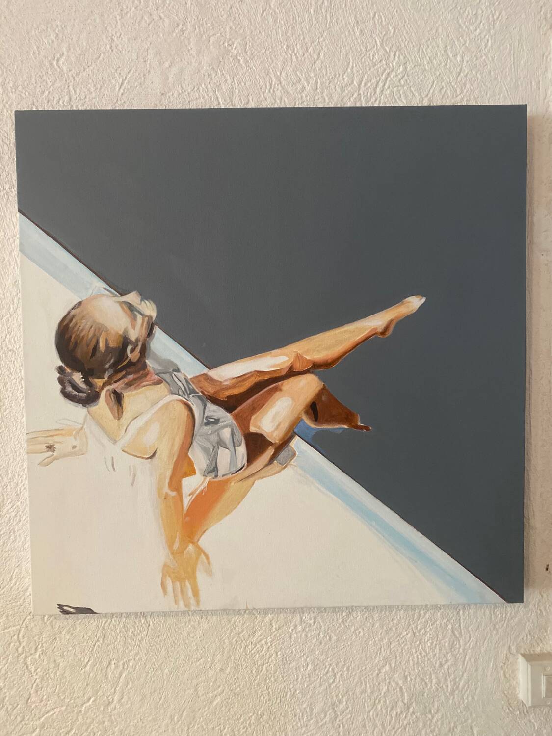 Seated woman painting