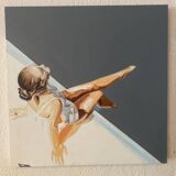 Seated woman painting