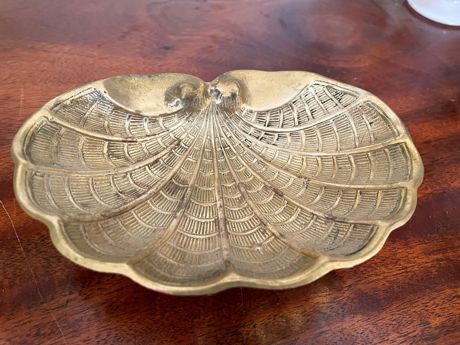 Old brass font pocket tray