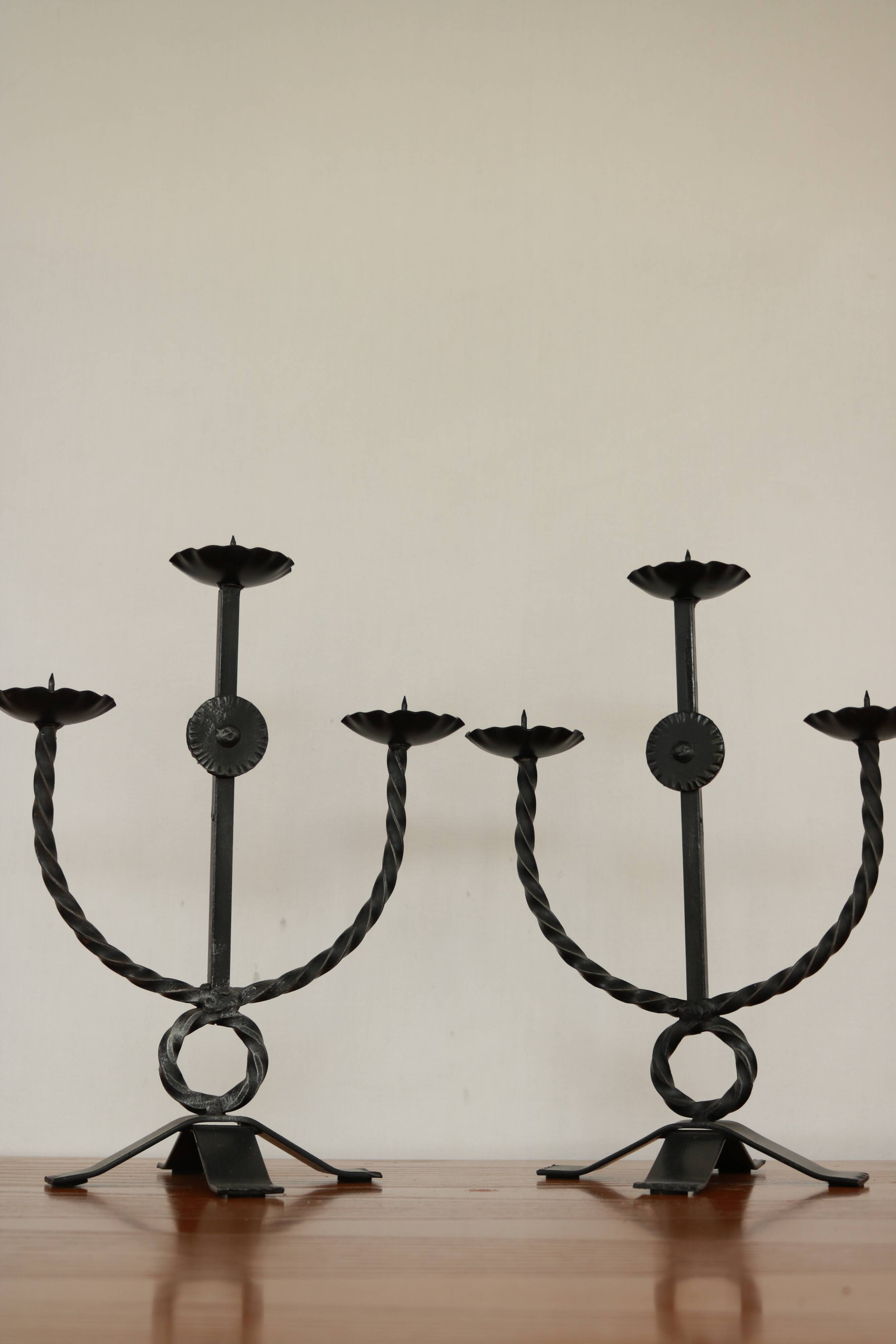 Brutalist style wrought iron candlesticks
