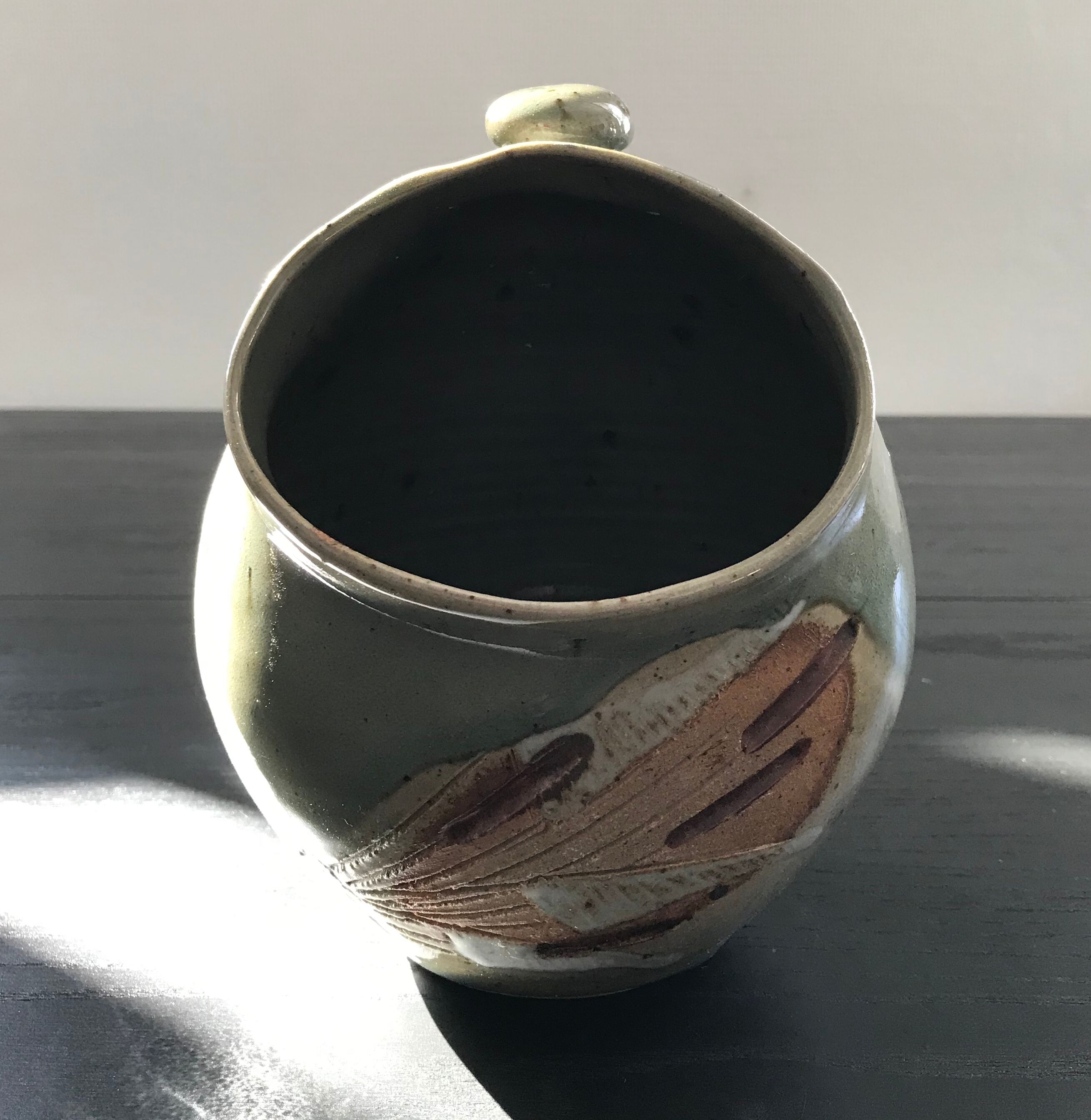 Hand has coarse salt in sandstone