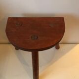 Old wooden tripod stool