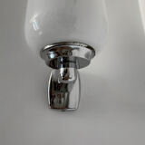 Chrome and opaline wall lights from the 70s.