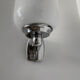 Chrome and opaline wall lights from the 70s.