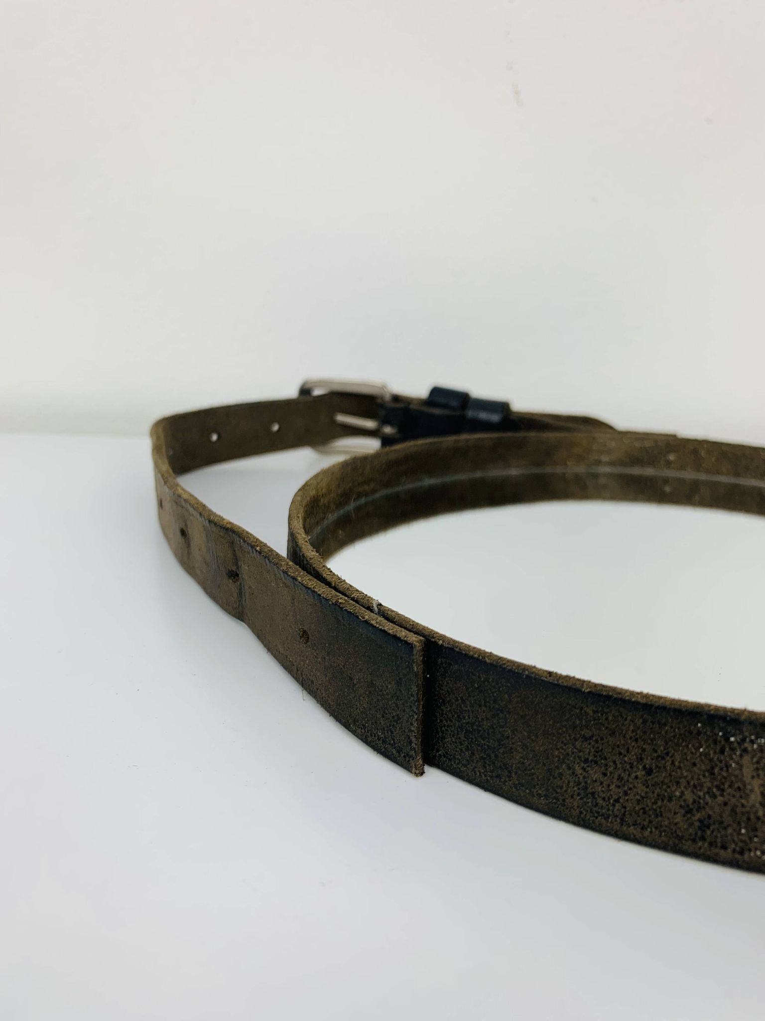 Mirror with handmade leather strapping
