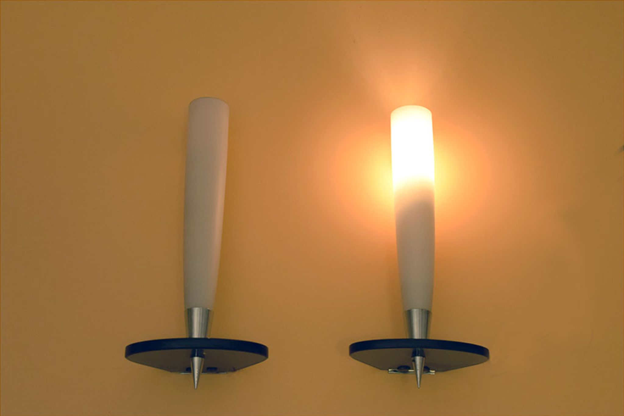 Set of two mid-century appliques in satin glass, crystal and chromed brass