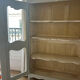 Antique French carved display cabinet with wire mesh doors