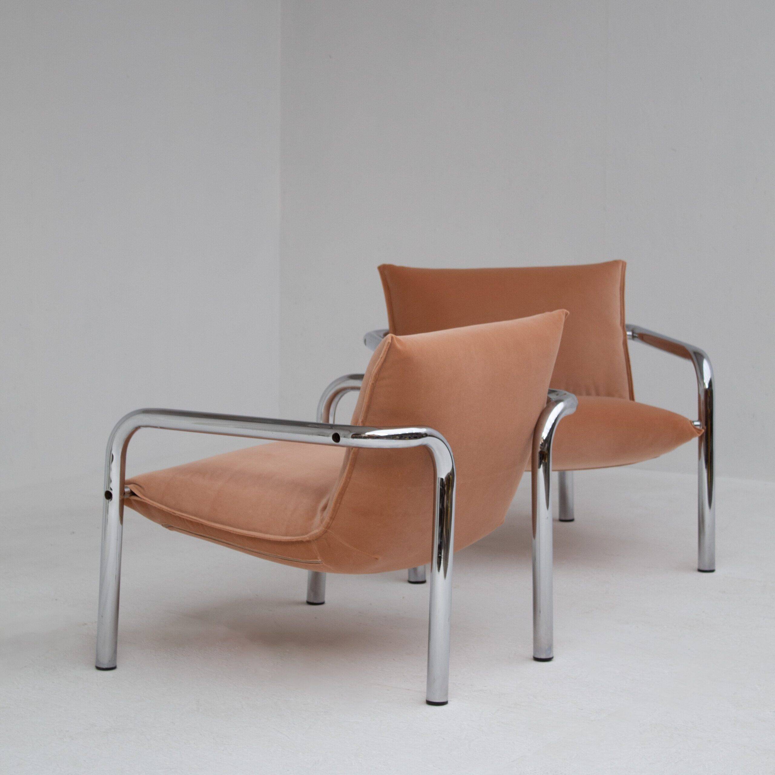 Pair of tubular armchairs in salmon velvet