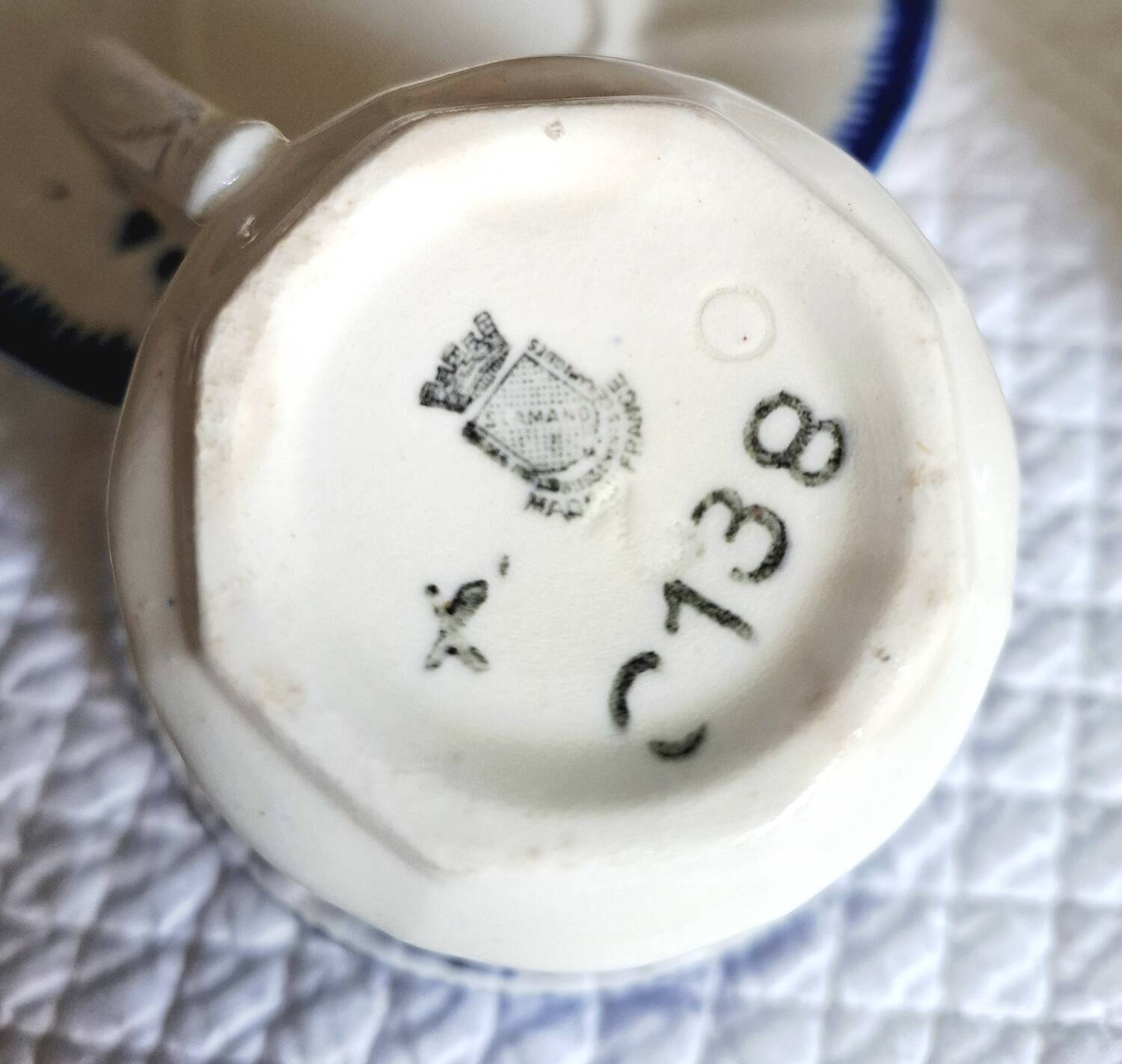 Antique cups with iron earthenware saucers