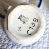 Antique cups with iron earthenware saucers