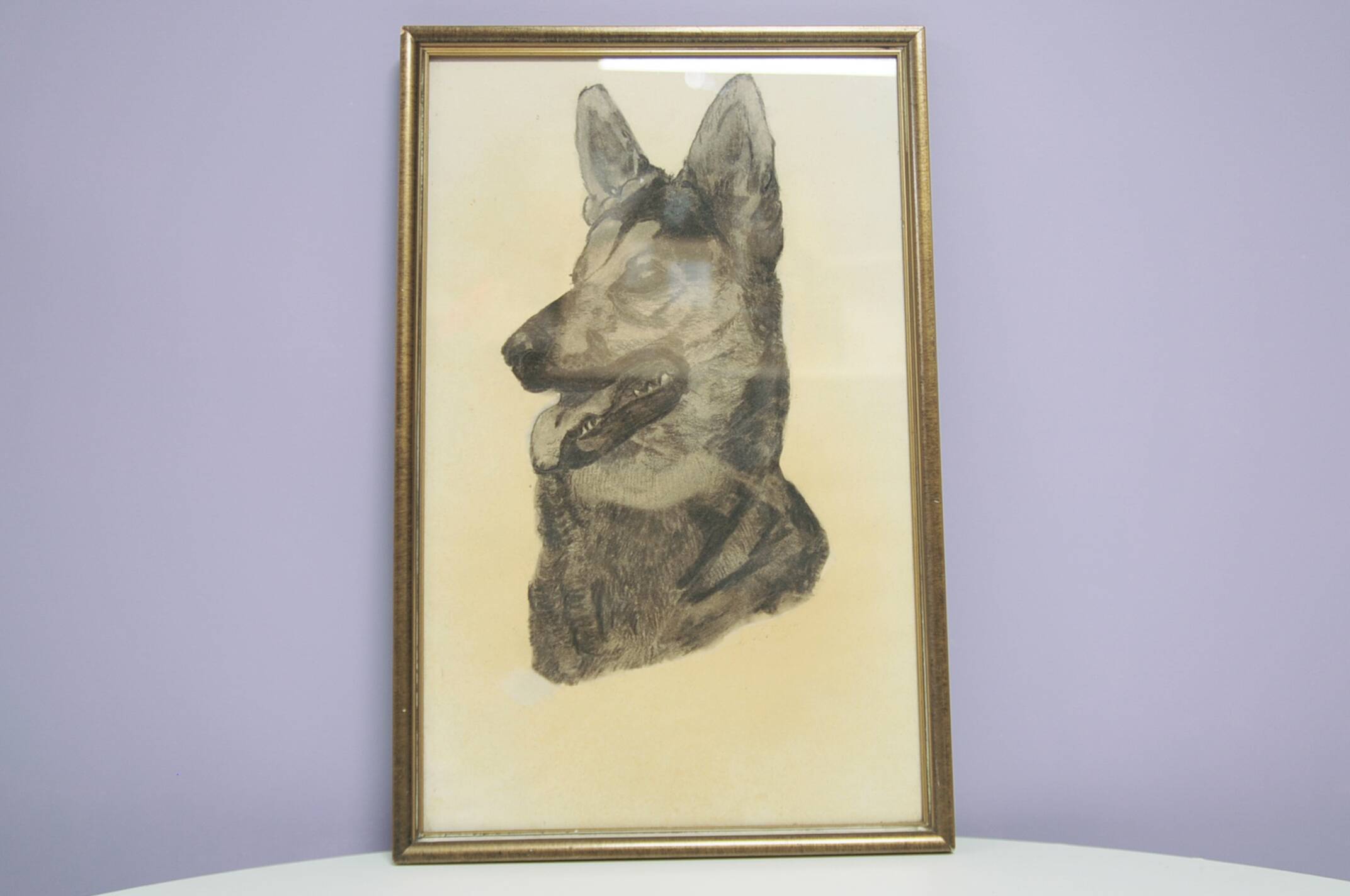 Golden frame with drawing of shepherd