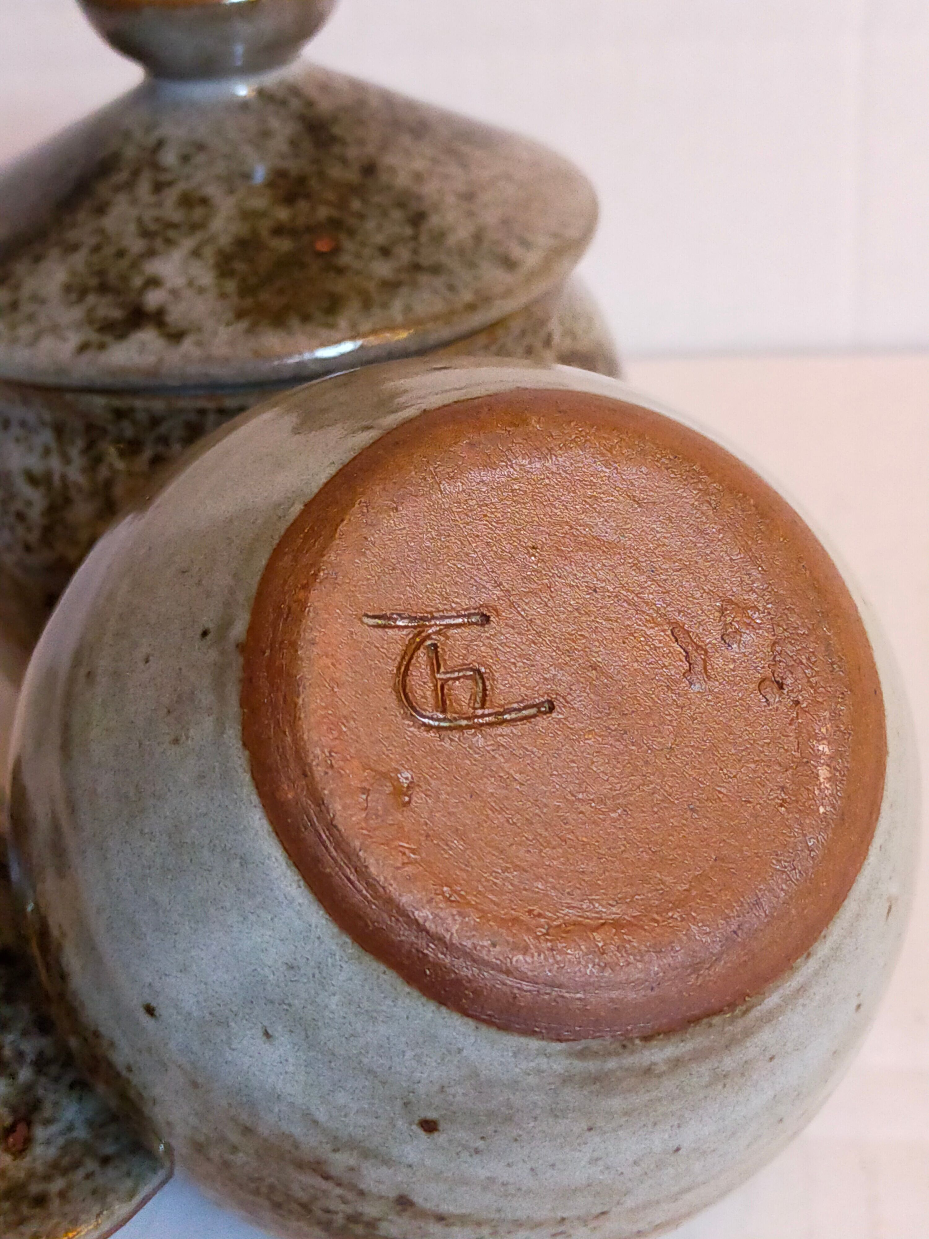 Duo of potter's pots covered in vintage glazed stoneware