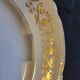 16 flat gold plates from Orchies porcelain