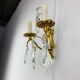 Bronze wall light with rococo style Louis XV pendants.