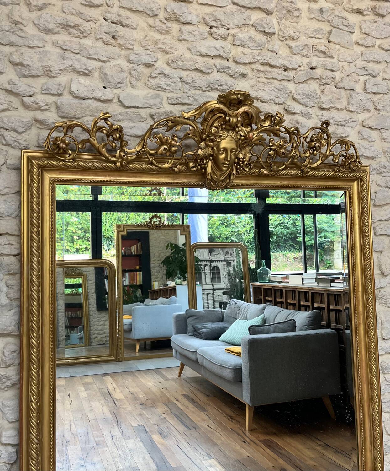 Pedimented mirror 184.5cm/135cm gilded with gold leaf