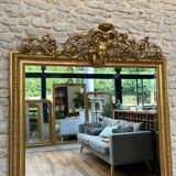 Pedimented mirror 184.5cm/135cm gilded with gold leaf