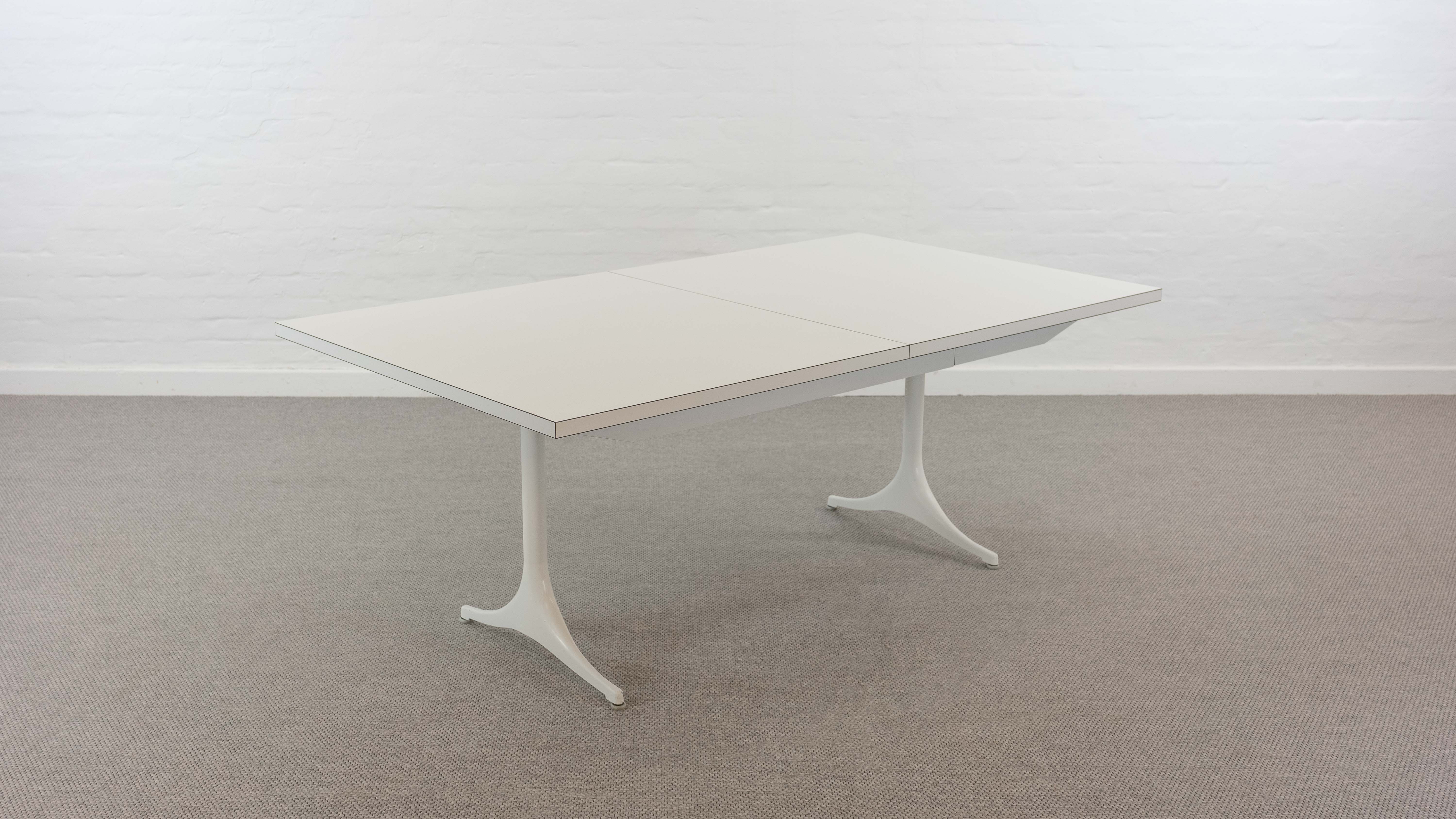 Extendable pedestal dining table by George Nelson for Herman Miller