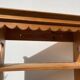 Wall shelf in raw wood with drawers and openwork hearts