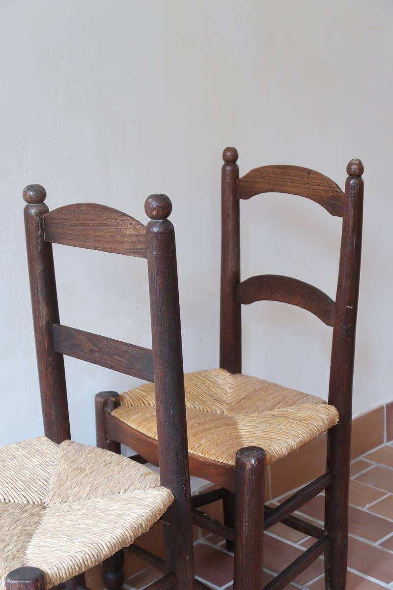 Pair of straw farm chairs