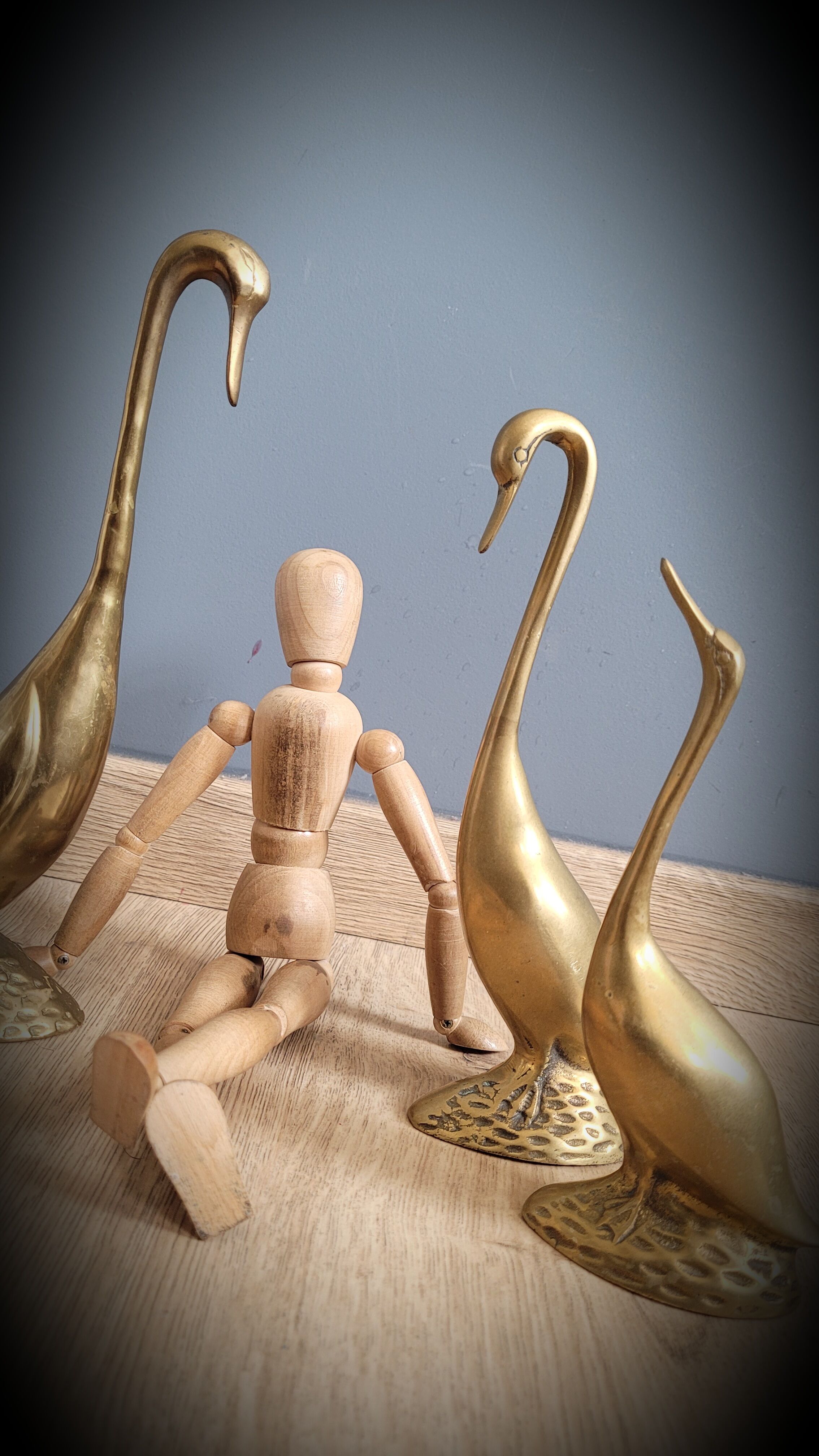 Trio of brass geese