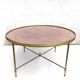 Round brass and wood coffee table