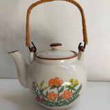 Flowered stoneware teapot with vintage rattan handle