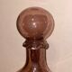 Bottle  in blown and bubbled glass