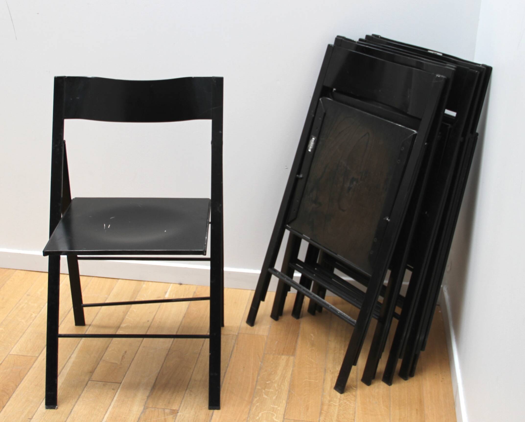 Suite of 12 folding designer chairs