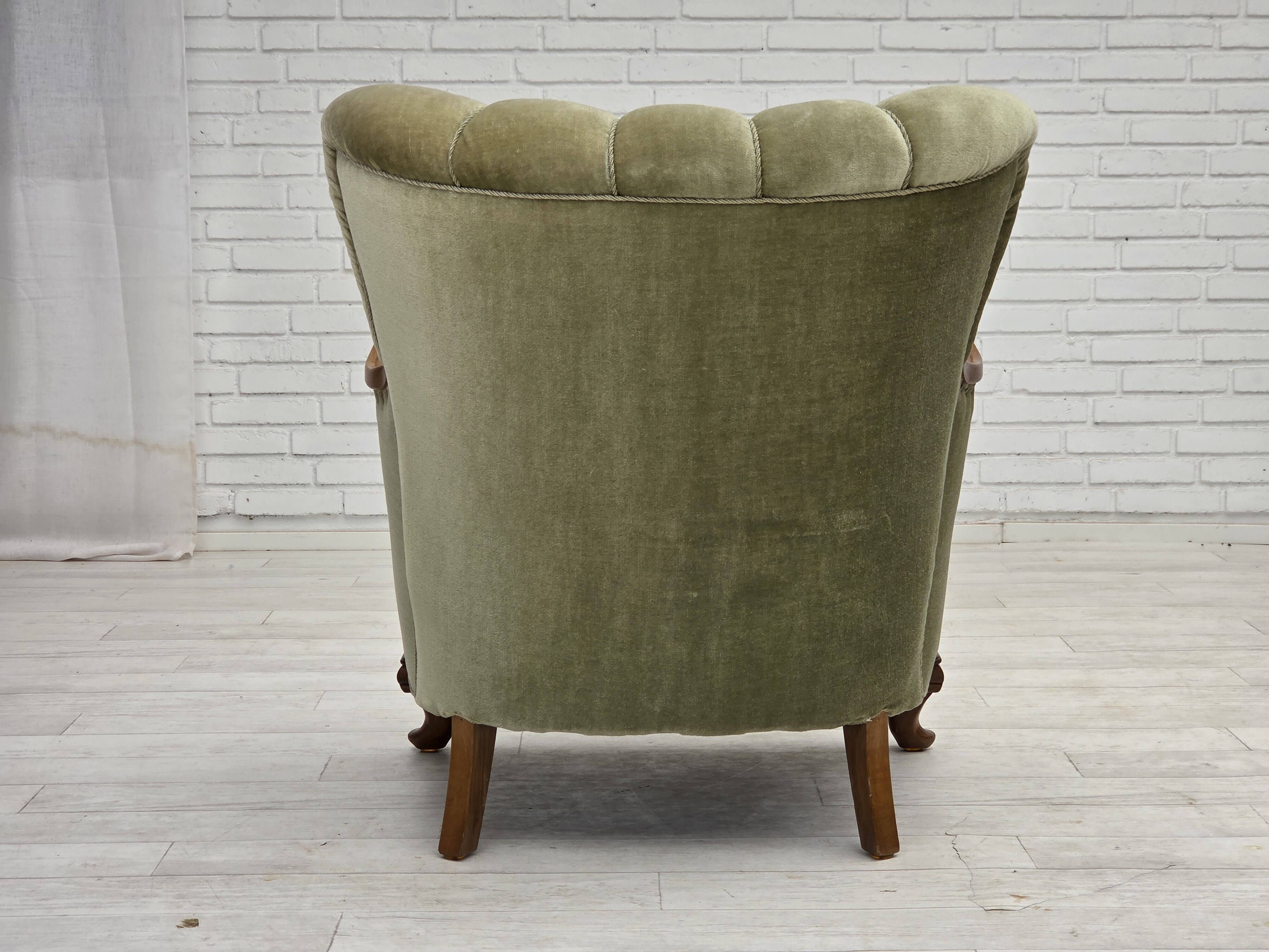 1960s, Danish armchair, green furniture velour, carved oak wood.