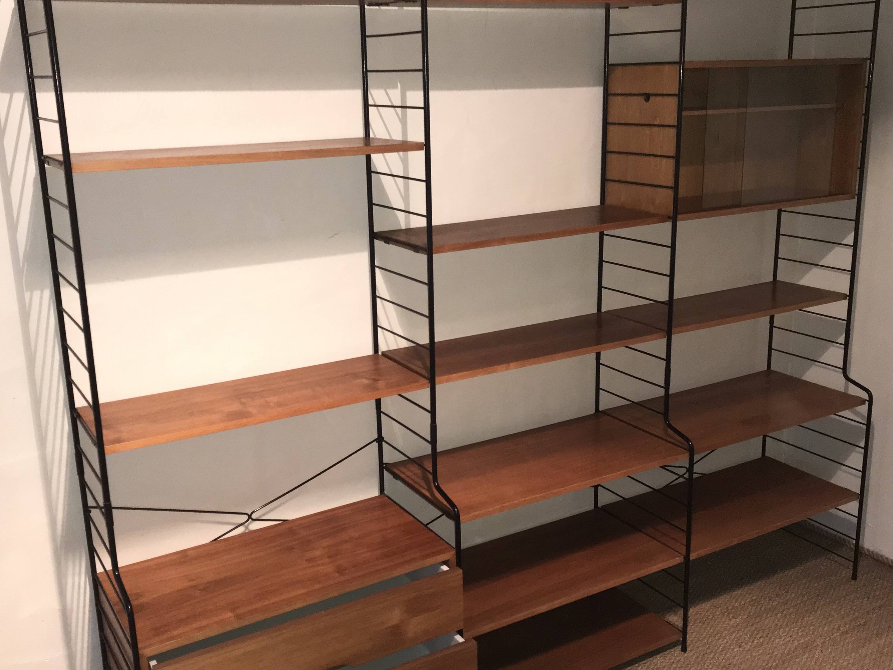Vintage modular wall-mounted library shelf in blond walnut 1960-80