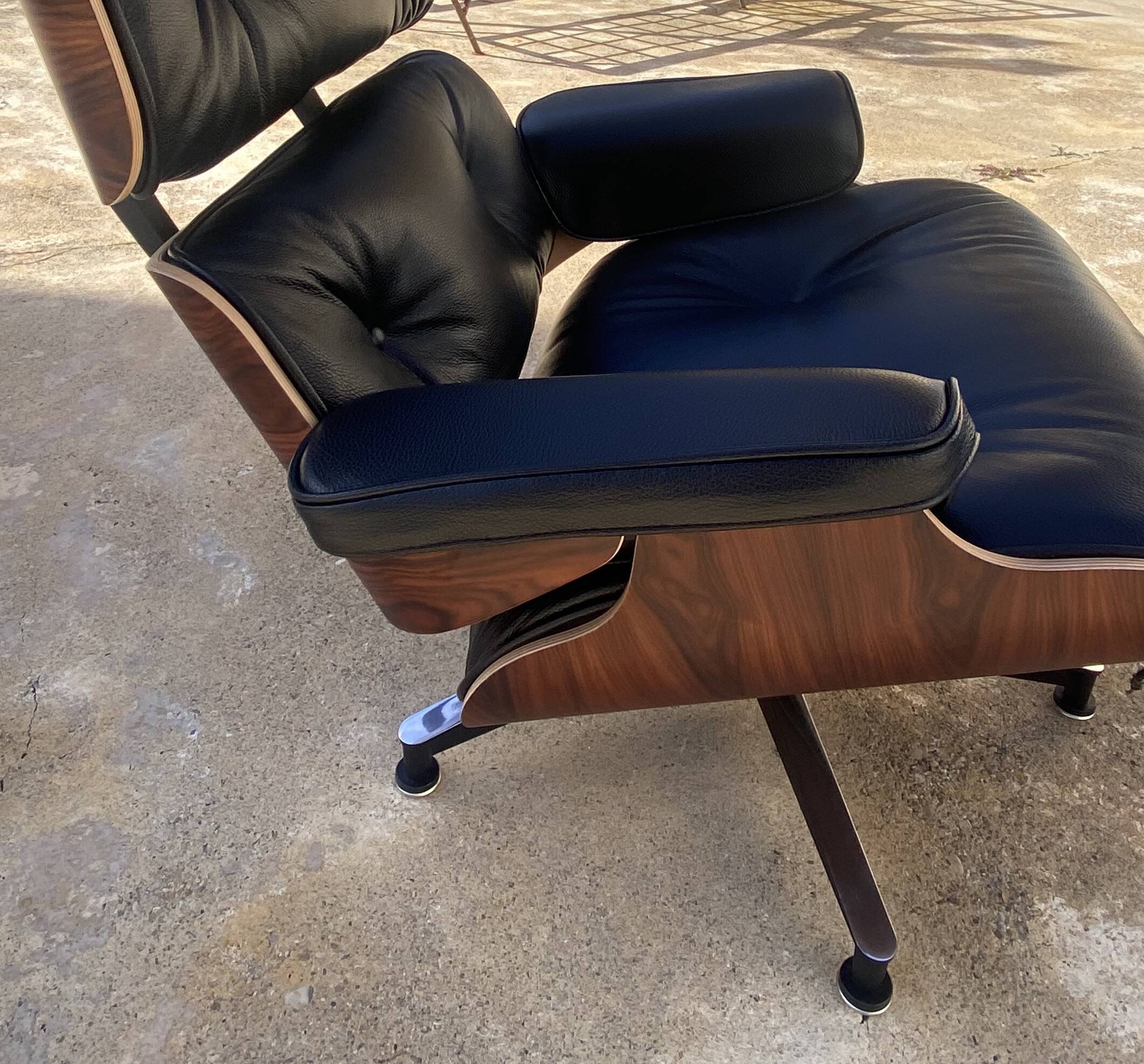 Fauteuil et Ottoman Charles Eames noir, Herman Miller, 2010