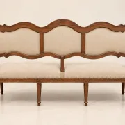 Louis XVI period canapé – Model with eel heads – Carved walnut